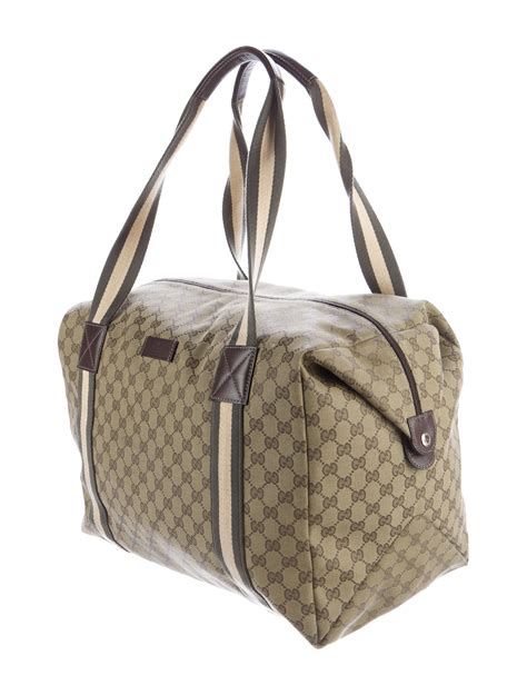 brown gucci duffle bag|gucci black canvas duffle bag.